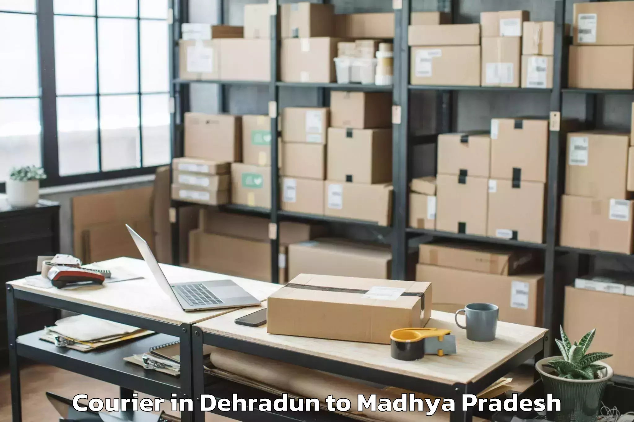 Book Dehradun to Malhargarh Courier Online